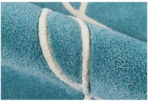 Momeni Bliss 5' X 7'6" Contemporary Hand Tufted Rug in Teal