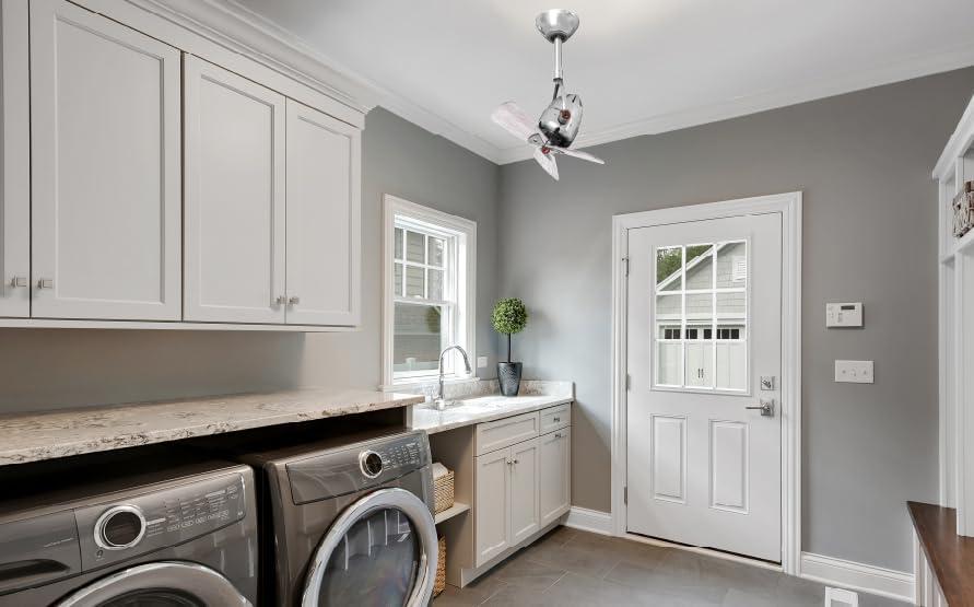 Diane oscillating ceiling fan in Polished Chrome finish with solid matte black wood blades.