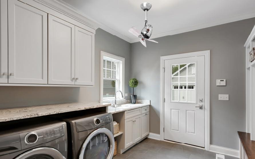 Diane oscillating ceiling fan in Polished Chrome finish with solid matte black wood blades.