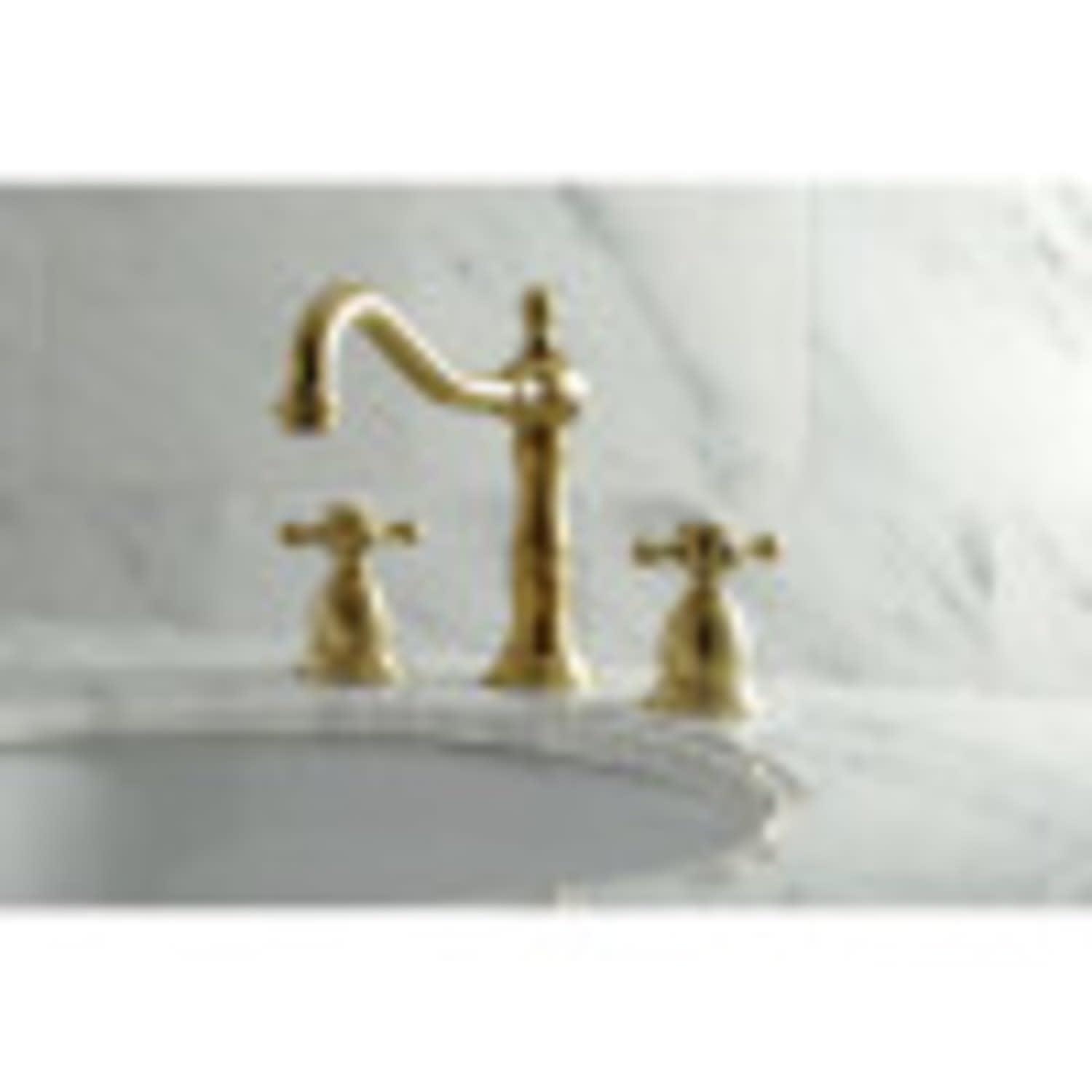 Kingston Brass Heritage Two-Handle 3-Hole Deck Mount Widespread Bathroom Faucet with Brass Pop-Up Drain