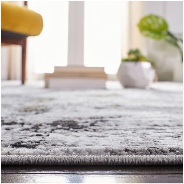 Amelia 9' x 12' Grey and Gold Synthetic Reversible Area Rug