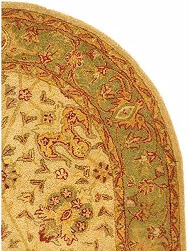 SAFAVIEH Antiquity Lilibeth Traditional Floral Wool Area Rug, Ivory, 4'6" x 6'6" Oval