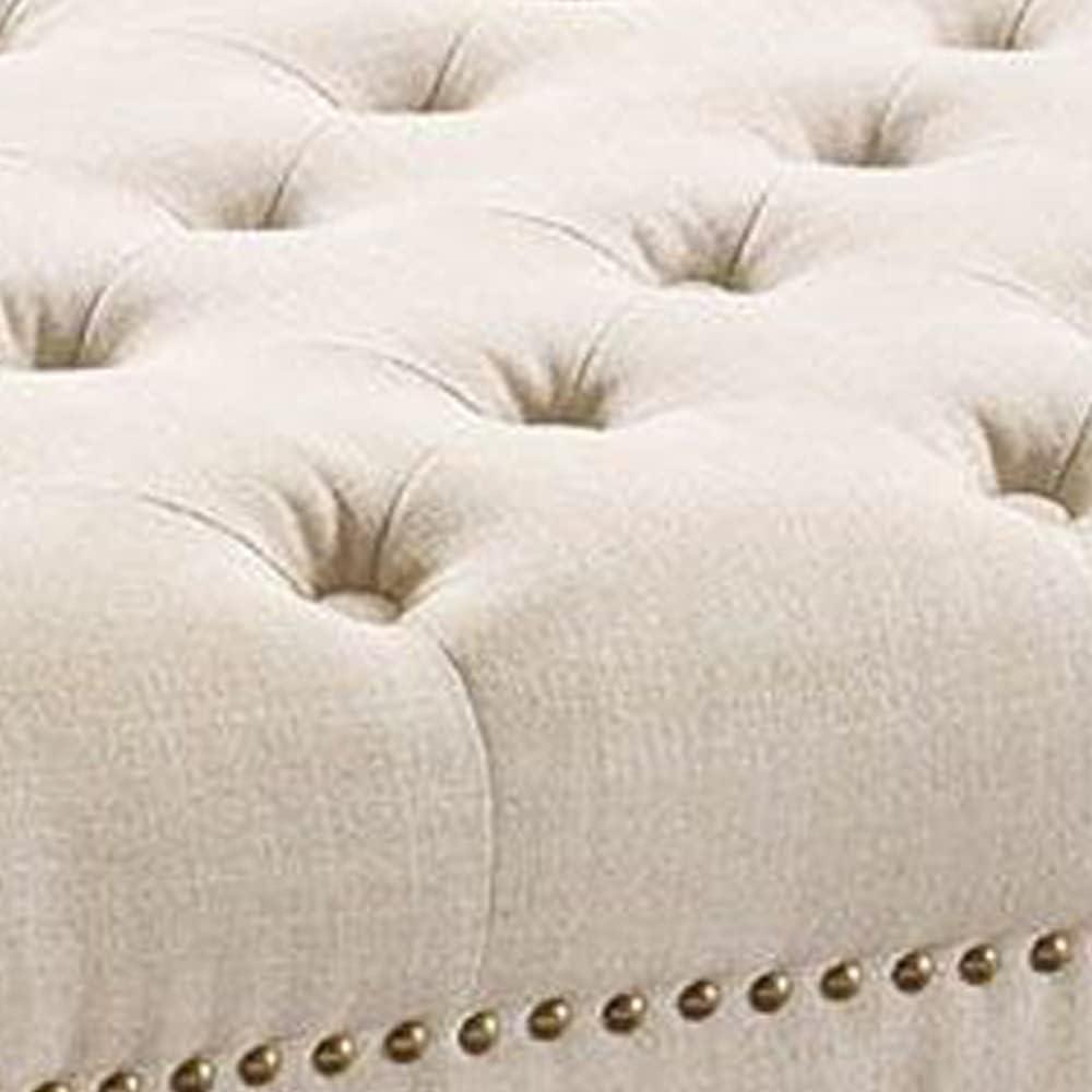 Isabelle 35" Tufted Linen Ottoman with Nailhead Accents