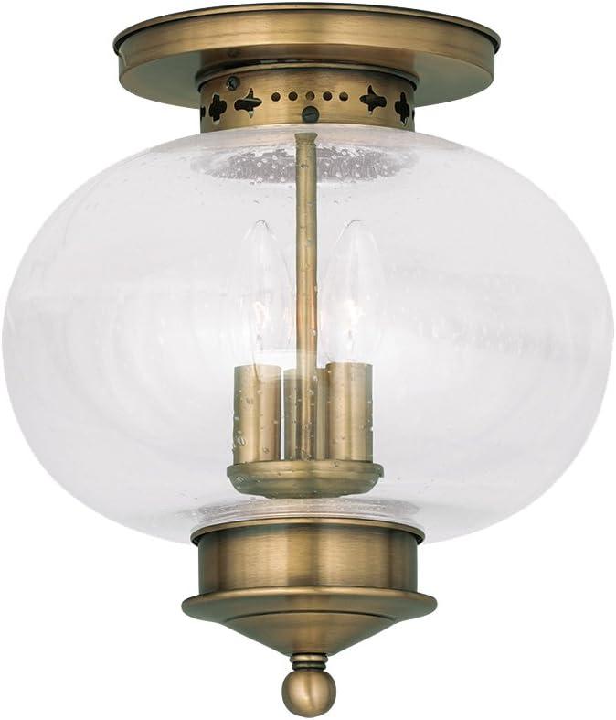 Harbor Antique Brass Globe LED Flush Mount with Hand Blown Seeded Glass