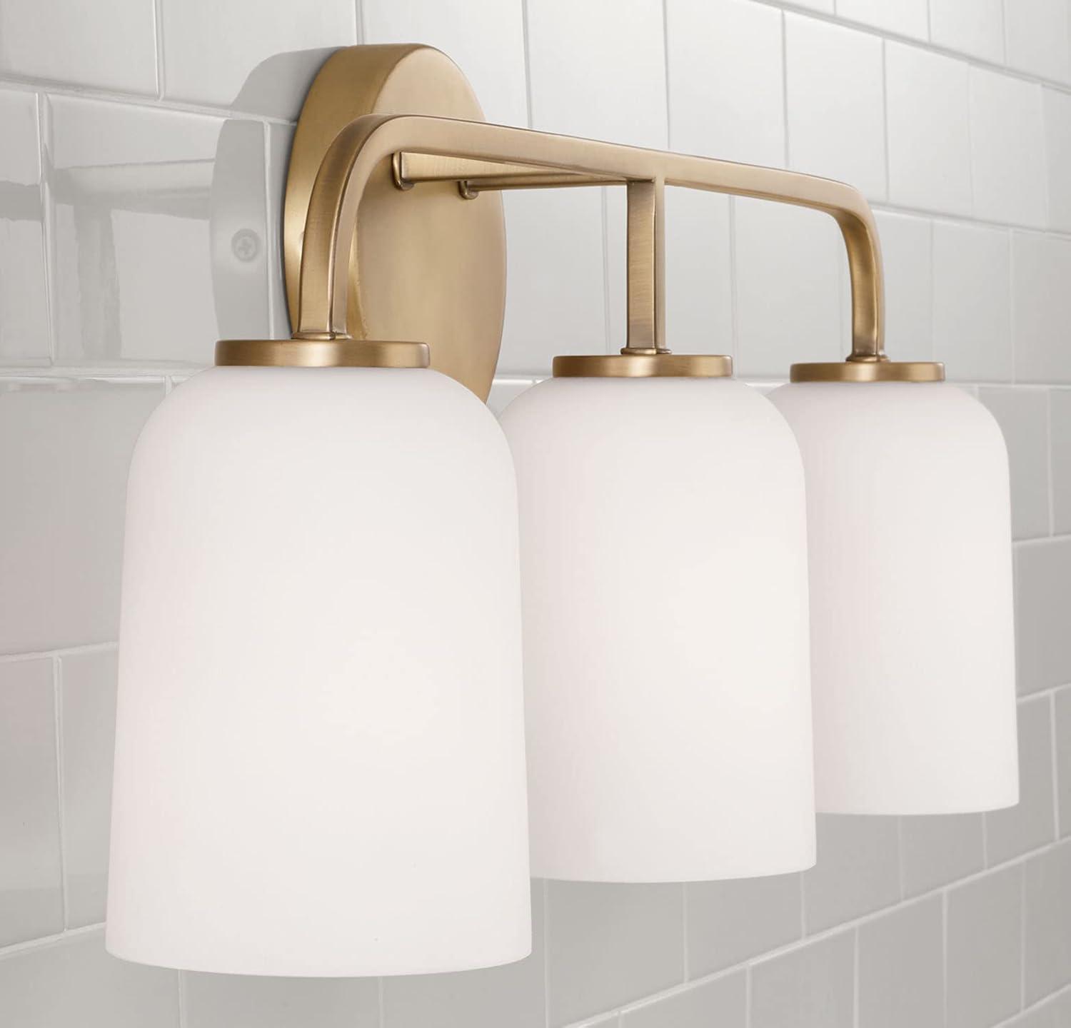 Aged Brass 3-Light Vanity with Soft White Glass Shades