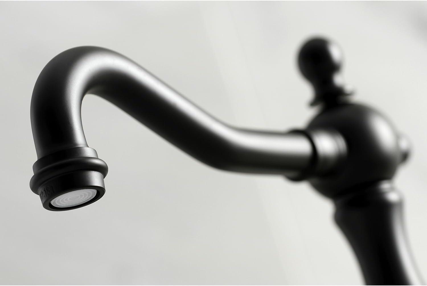 Kingston Brass Heritage Two-Handle 3-Hole Deck Mount Widespread Bathroom Faucet with Brass Pop-Up Drain