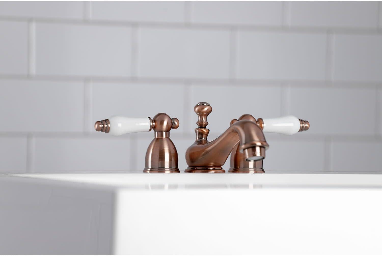 Kingston Brass KS3951PL Kingston Brass Restoration Two-Handle 3-Hole Deck Mount Mini-Widespread Bathroom Faucet with Brass Pop-Up