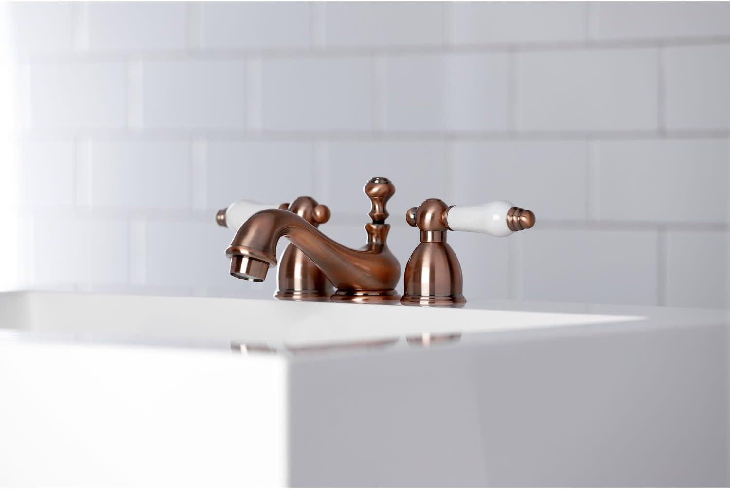 Kingston Brass KS3951PL Kingston Brass Restoration Two-Handle 3-Hole Deck Mount Mini-Widespread Bathroom Faucet with Brass Pop-Up