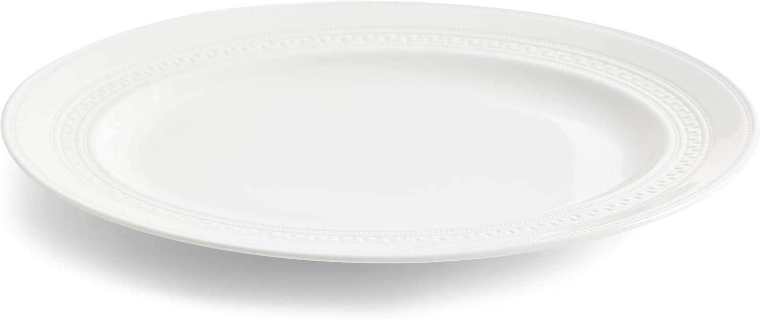 White Ceramic Oval Platter with Intricate Detailing