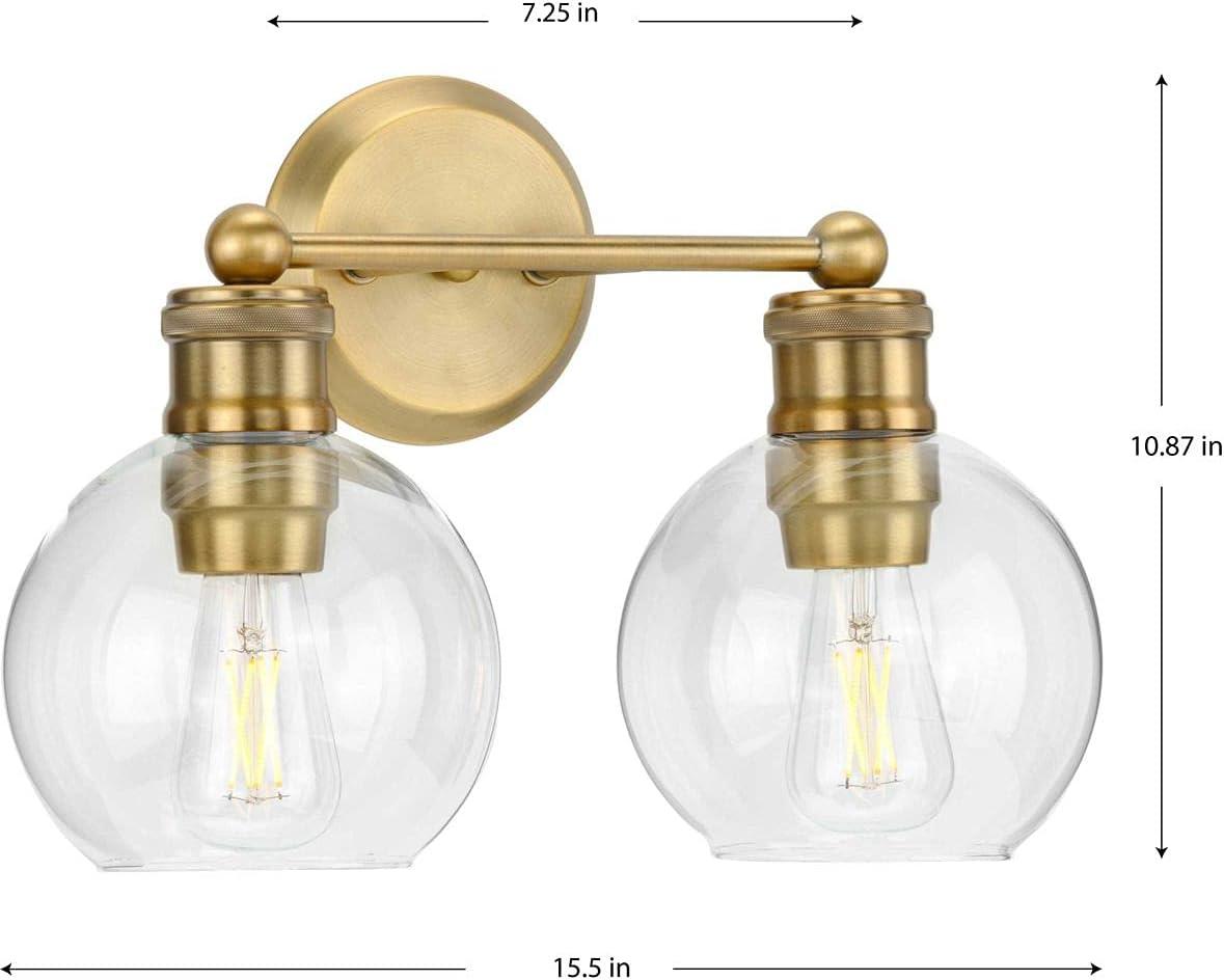 Progress Lighting Hansford 2-Light Bath Light Vintage Brass with Clear Globe Glass Shade