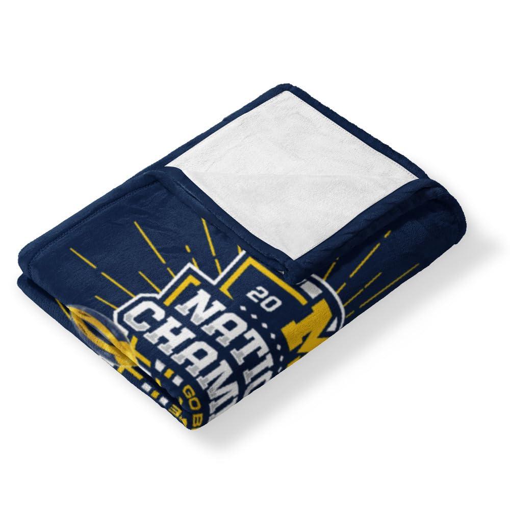 Michigan Wolverines 2023 National Champions Blue Silk Touch Throw Blanket