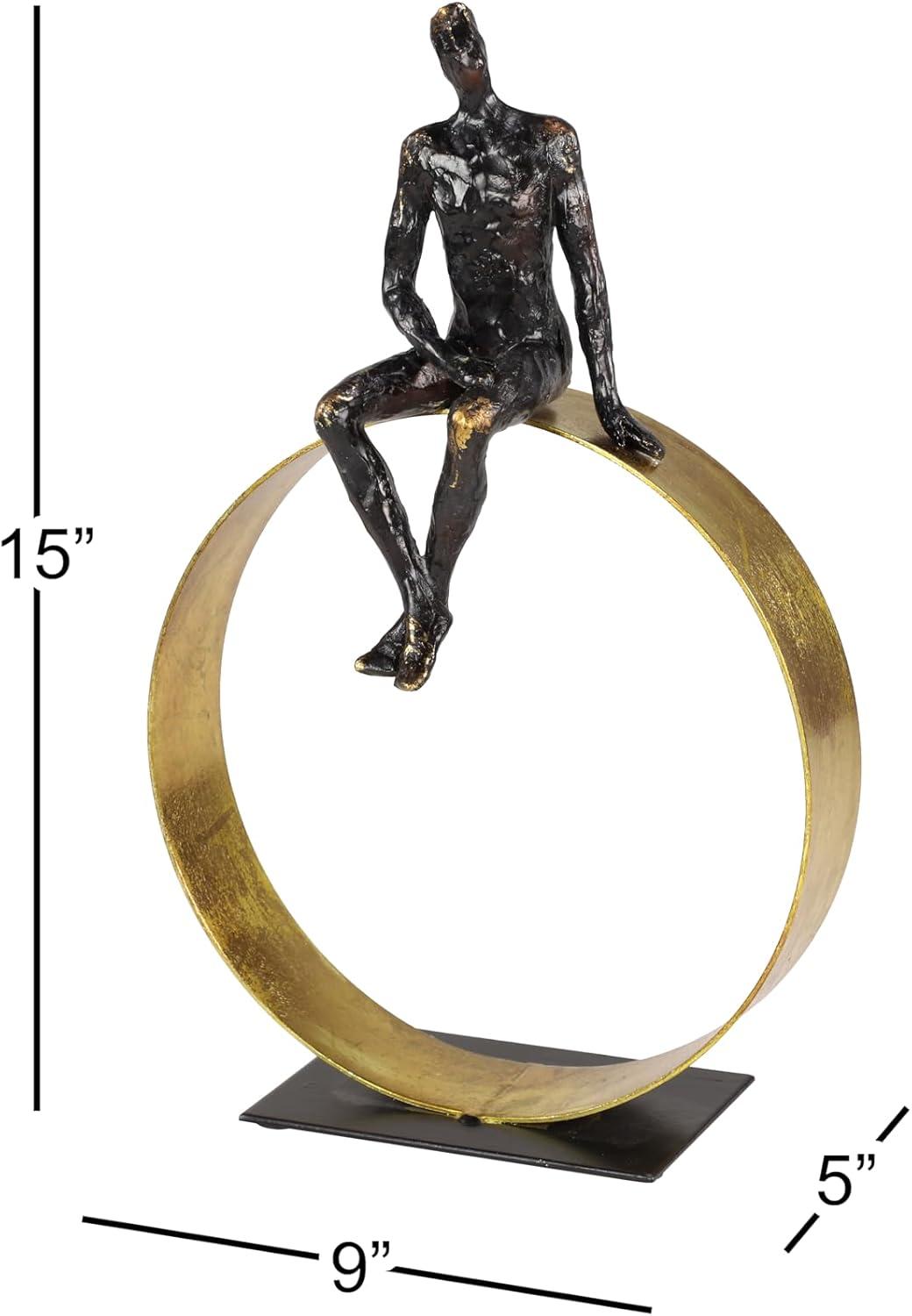 Black and Gold Resin Human Figurine on Circular Base