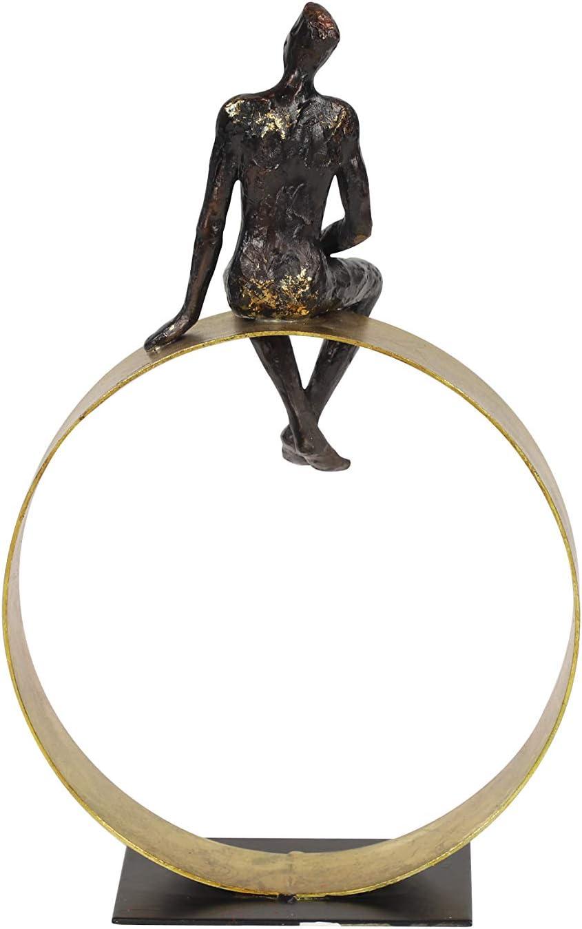 Black and Gold Resin Human Figurine on Circular Base