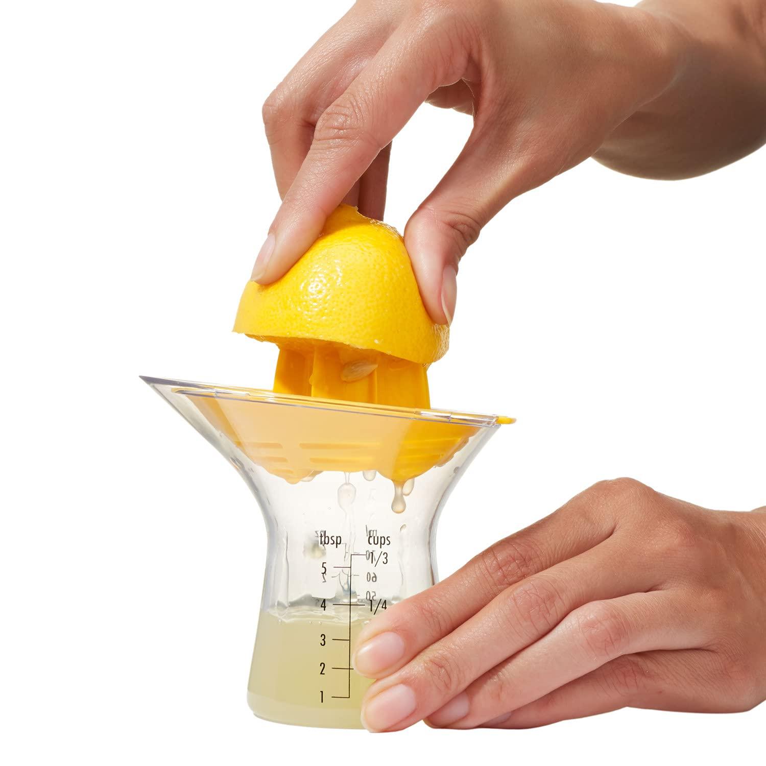 Yellow and Clear Plastic Citrus Juicer with Measurement Markings