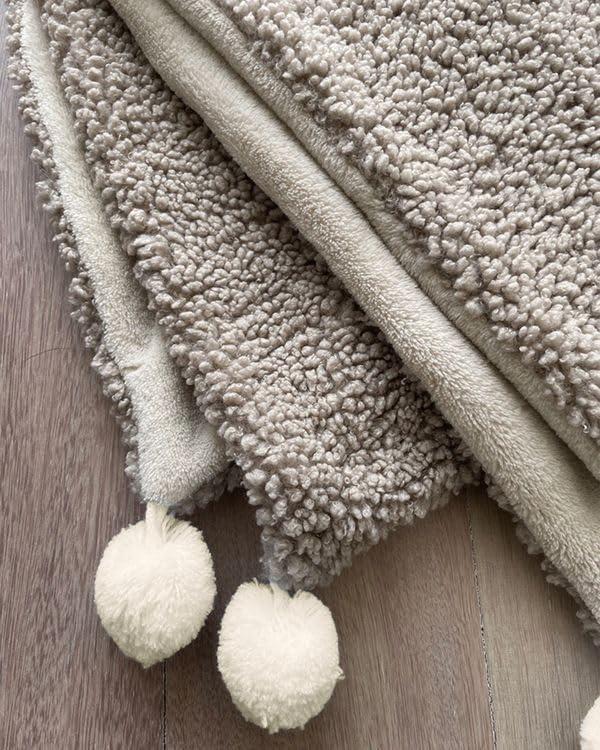 Oatmeal Fleece Baby Blanket with Pom-Pom Accents
