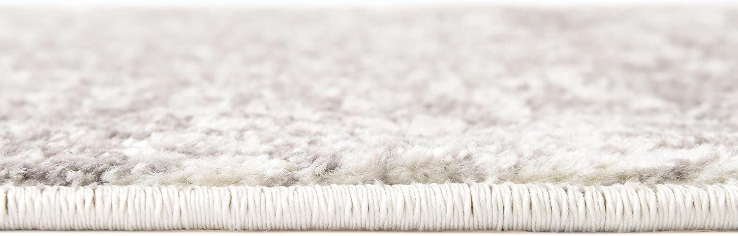 White Medallion 4' x 6' Stain-Resistant Synthetic Area Rug