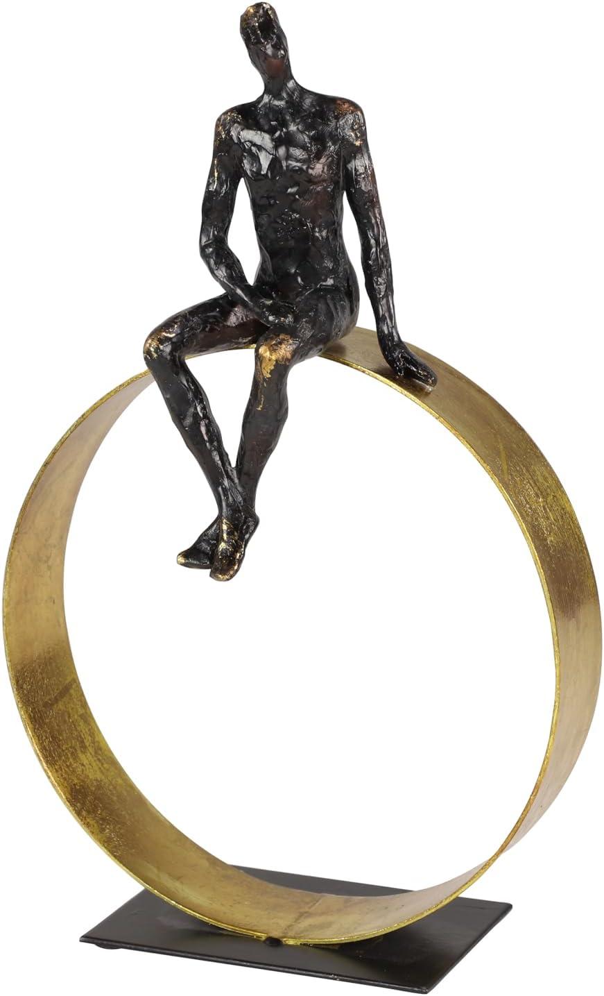 Black and Gold Resin Human Figurine on Circular Base