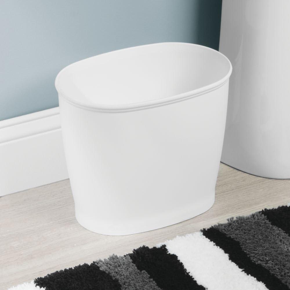 Compact White Plastic Oval Wastebasket with Wheels