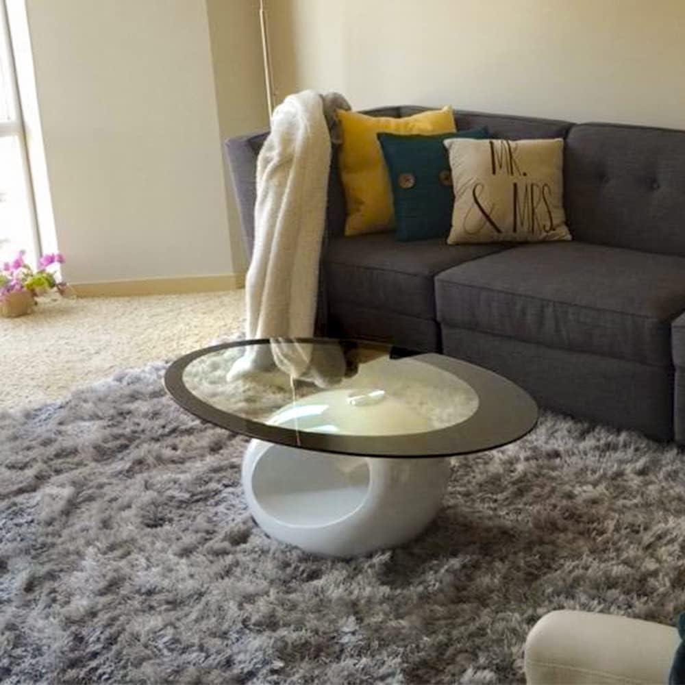 Orren Ellis Glass Top Coffee Table