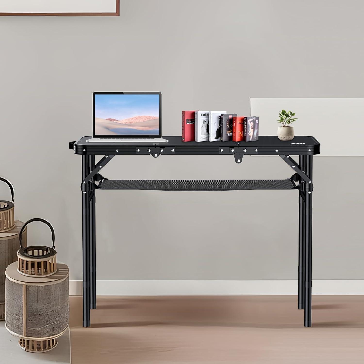 Black Aluminum Folding Camping Table with Adjustable Heights and Storage Net