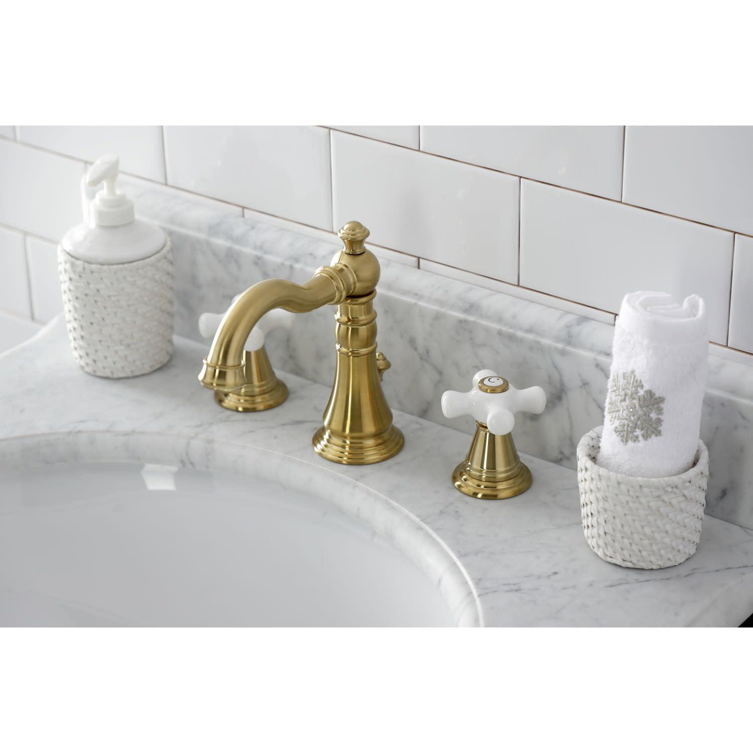 Kingston Brass American Classic Two-Handle 3-Hole Deck Mount Widespread Bathroom Faucet with Pop-Up Drain