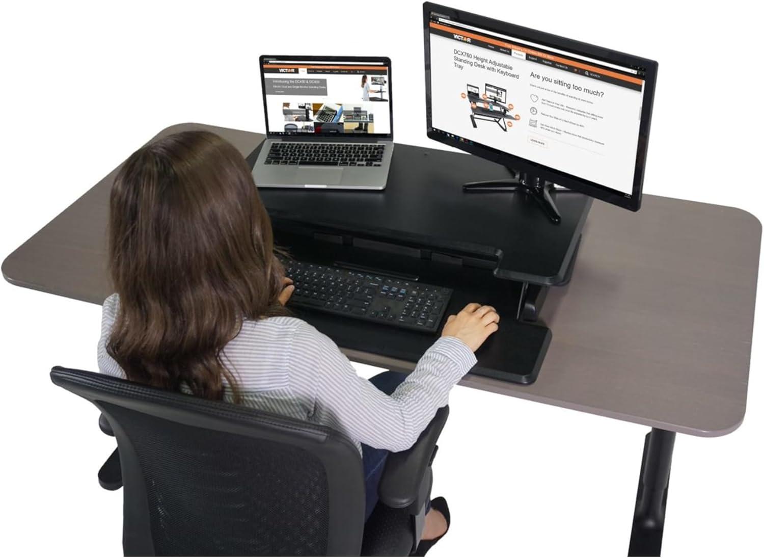 Victor DCX610 Height Adjustable Compact Standing Desk| Black| 33” Wide Sit-Stand Dual Monitor Desk and Laptop Riser Workstation| Compatible with Most Monitor Arms