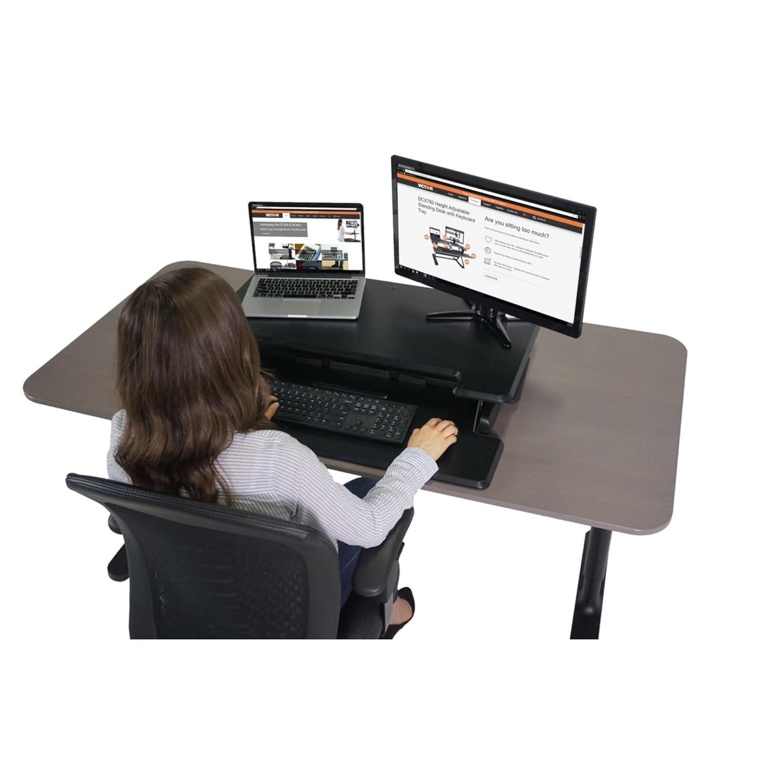 Victor DCX610 Height Adjustable Compact Standing Desk| Black| 33” Wide Sit-Stand Dual Monitor Desk and Laptop Riser Workstation| Compatible with Most Monitor Arms