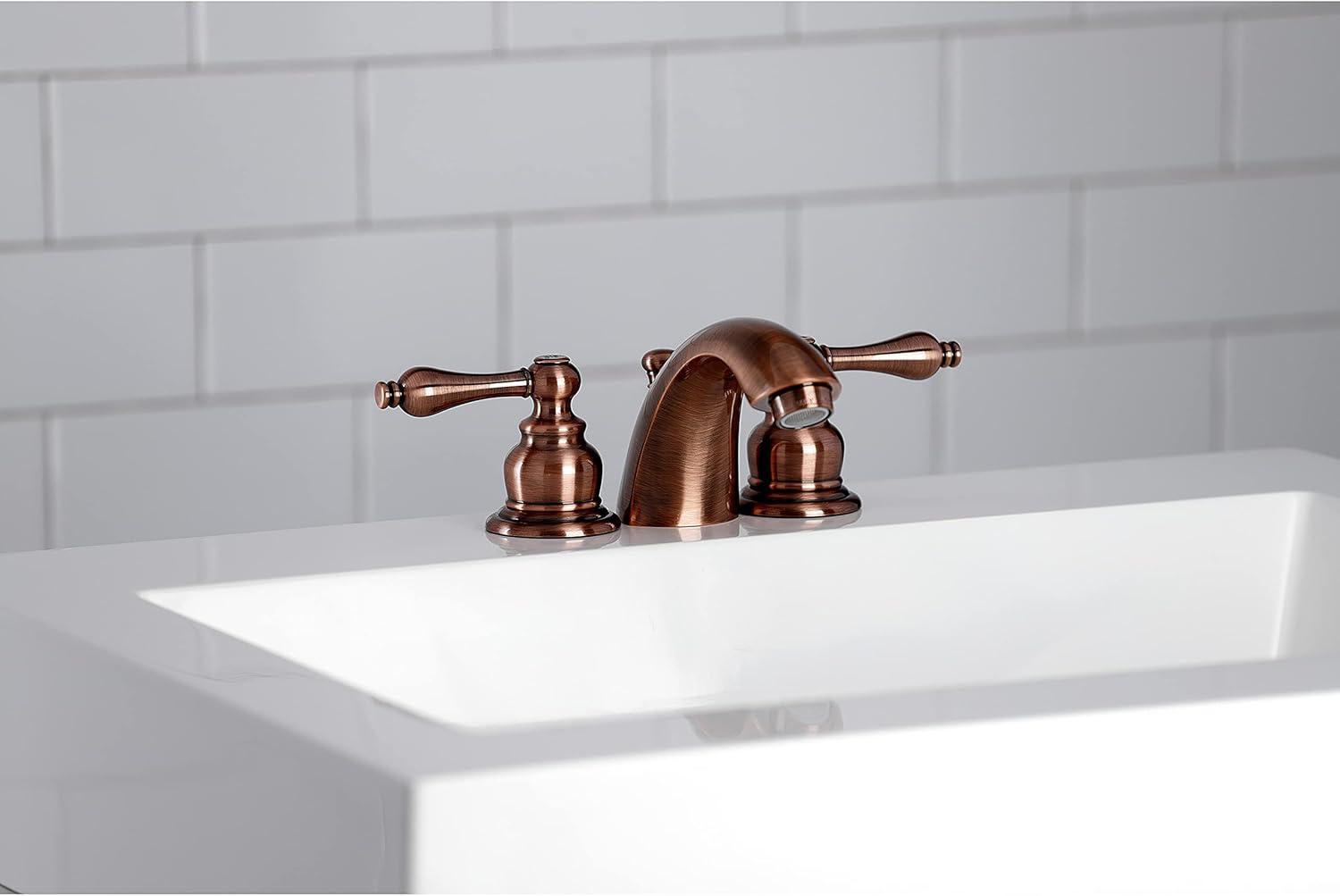 Kingston Brass Victorian Two-Handle 3-Hole Deck Mount Mini-Widespread Bathroom Faucet with Plastic Pop-Up