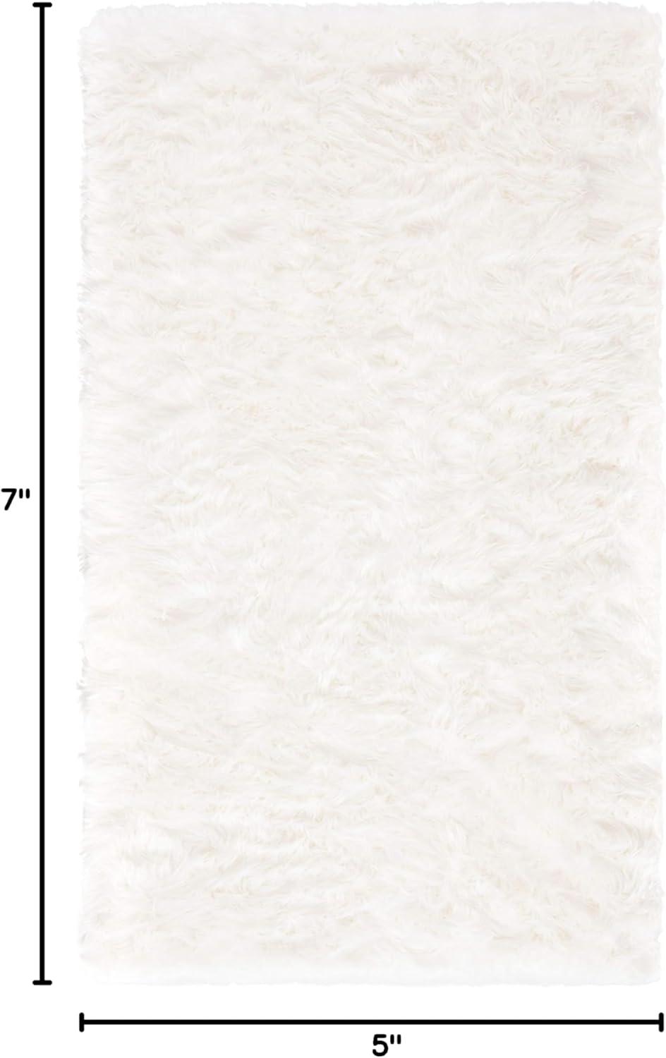 SAFAVIEH Faux Sheep Skin Vesna Solid Plush Area Rug, Ivory, 5' x 7'