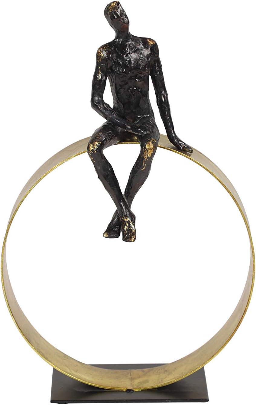 Black and Gold Resin Human Figurine on Circular Base