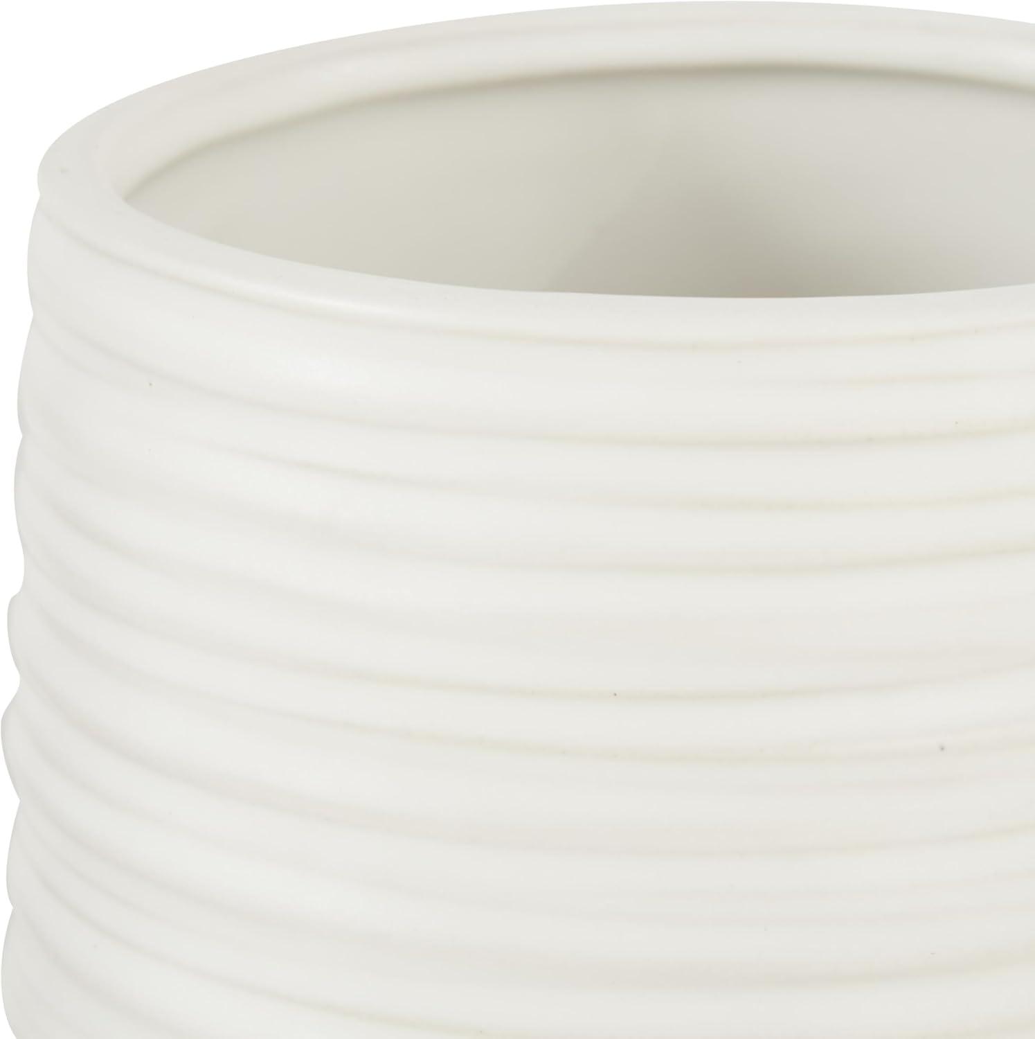 CosmoLiving by Cosmopolitan 7" Ribbed White Porcelain Vase