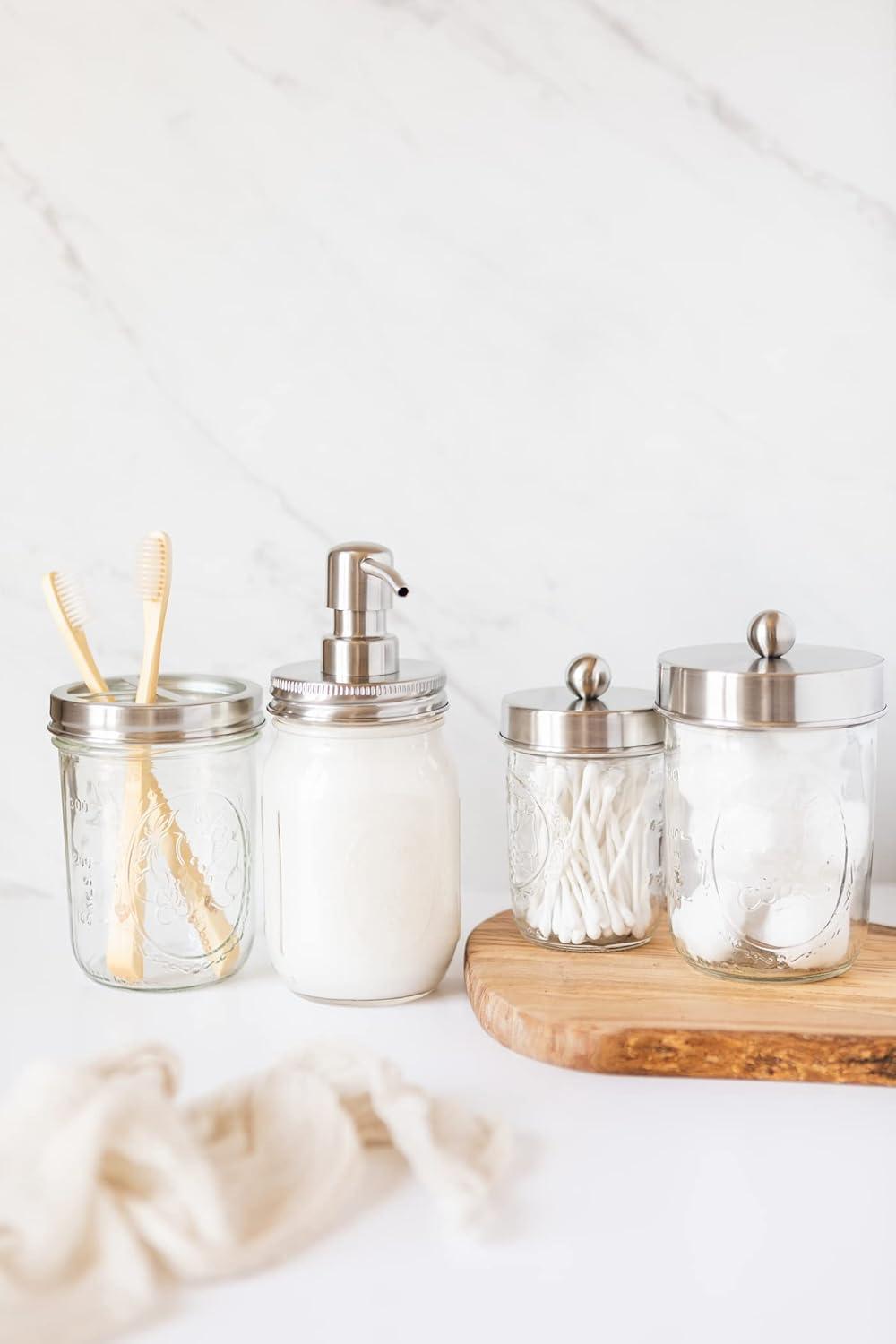 Mason Jar Bathroom Gift Set (4 pcs) - Lotion/Soap Dispenser, Toothbrush Holder, Q-Tip Storage Jars - Farmhouse Home Decor for Vanity Organization - Luxury Bathroom Accessories - Stainless Steel