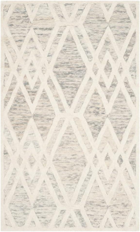 Cambridge CAM729 Hand Tufted Area Rug  - Safavieh