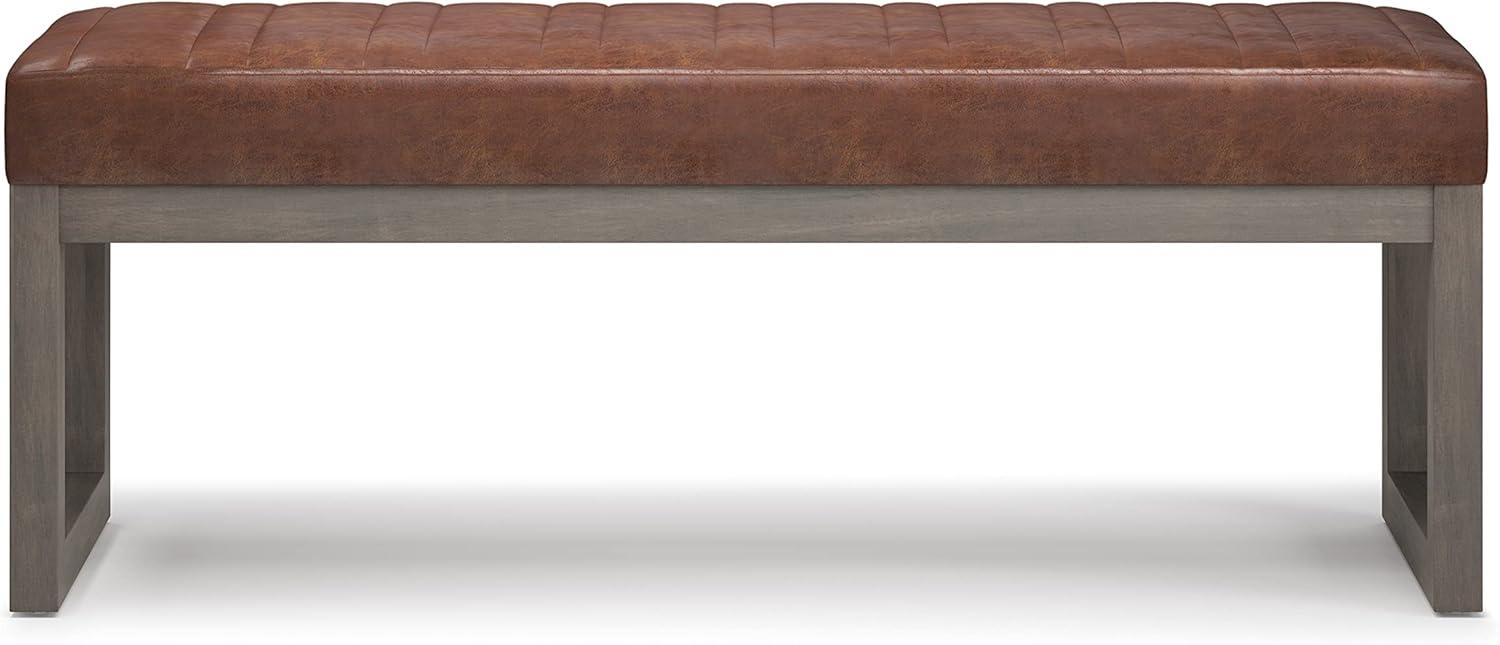 Simpli Home Casey 48" Wd. Ottoman Bench in Distressed Saddle Brown Faux Leather