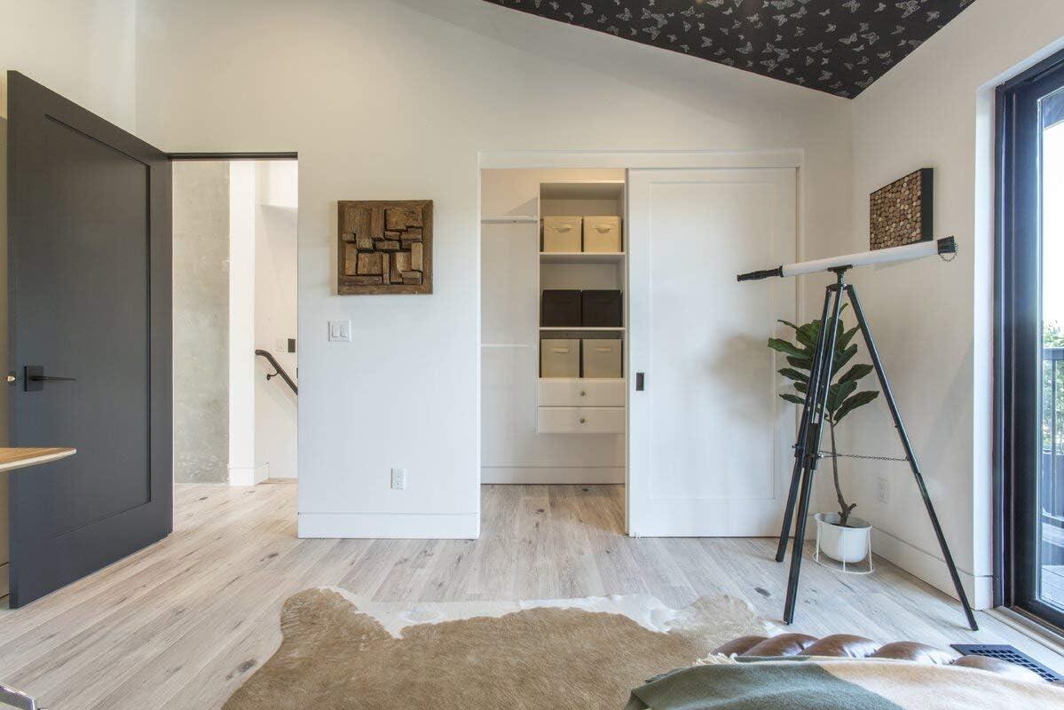 White Wall-Mounted L-Shaped Closet System with Drawers