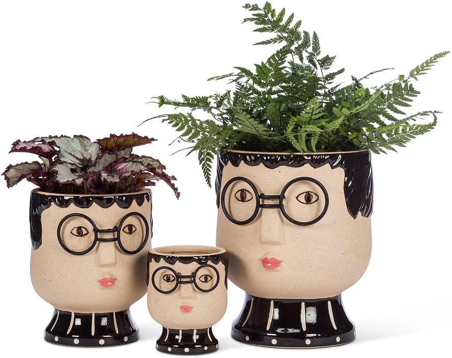 Beige Stoneware Planter with Black Glasses and Turtleneck