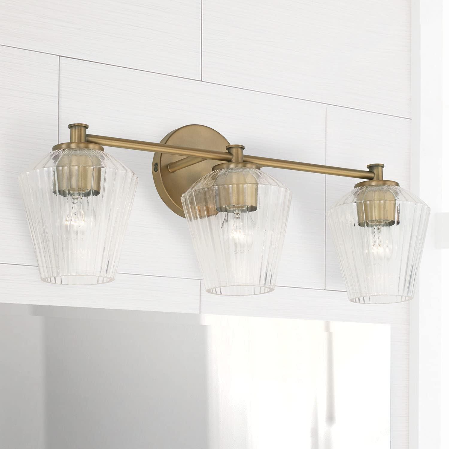 Aged Brass and Clear Glass 3-Light Vanity Fixture