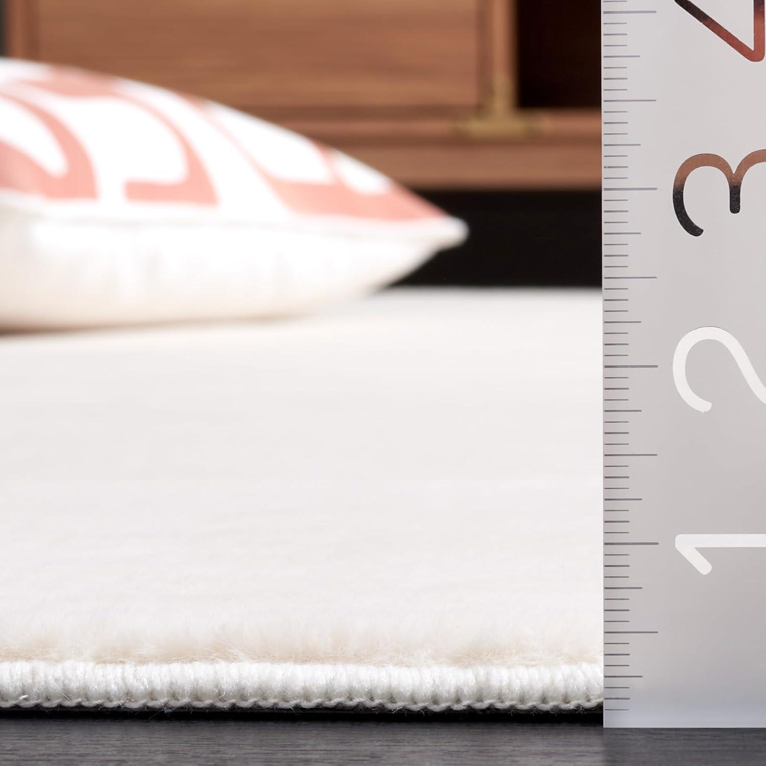 Safavieh  Faux Rabbit Fur Machine Washable Slip Resistant Nanami Rug 5' x 7' - Beige