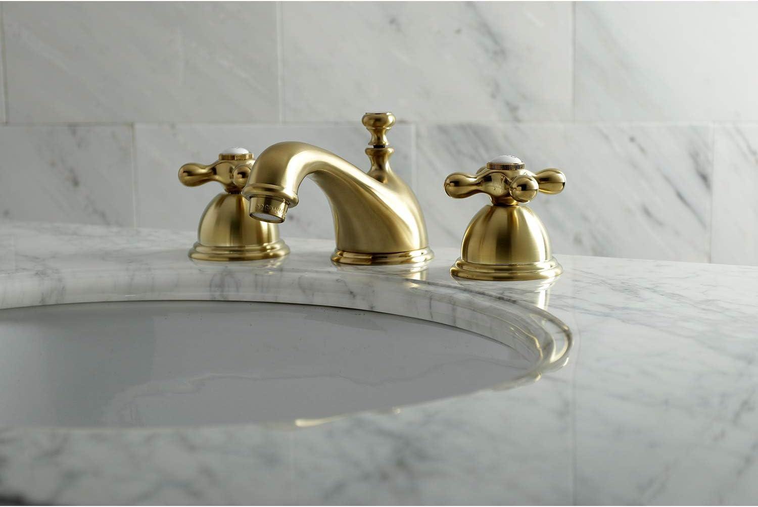 Kingston Brass Duchess Two-Handle 3-Hole Deck Mount Widespread Bathroom Faucet with Brass Pop-Up Drain