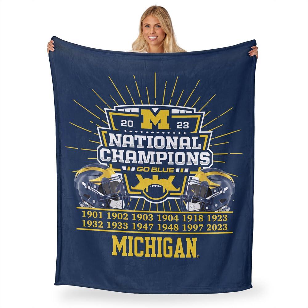 Michigan Wolverines 2023 National Champions Blue Silk Touch Throw Blanket