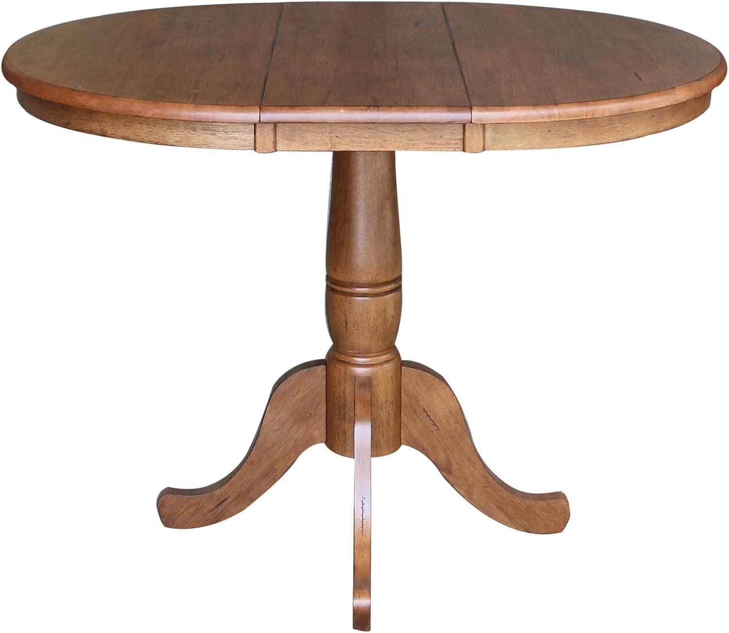 Keanan Round Top Pedestal Table with 12" Drop Leaf Distressed Oak - International Concepts