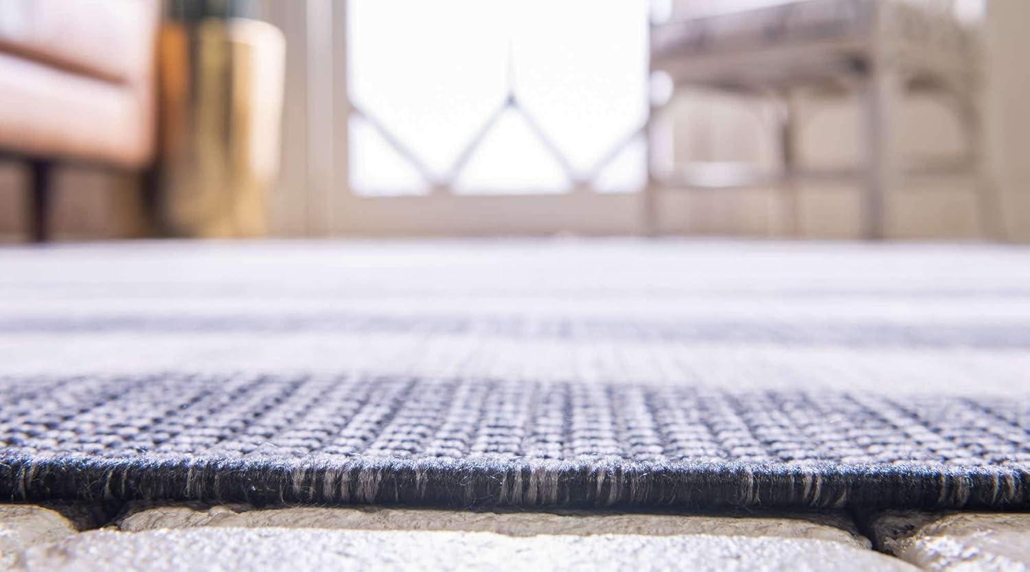 Round Gray and Black Striped Outdoor Rug