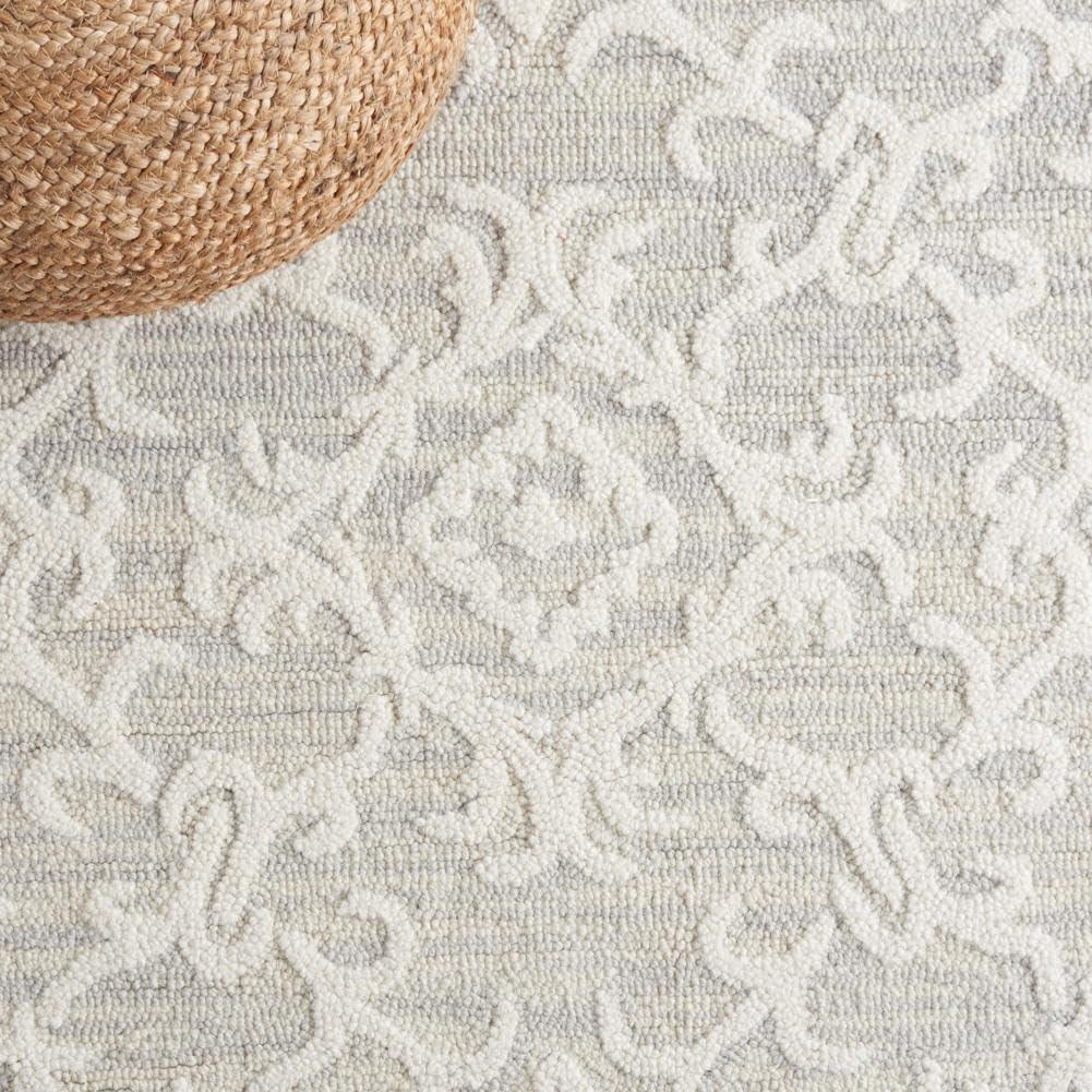 SAFAVIEH Blossom Cletus Geometric Wool Area Rug, Green/Ivory, 10' x 14'