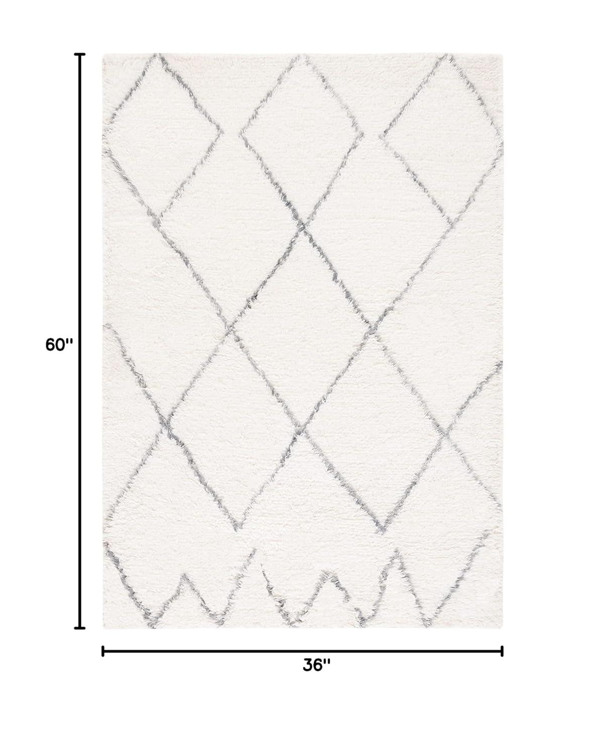Henrie Geometric Handwoven Area Rug in Ivory/Gray
