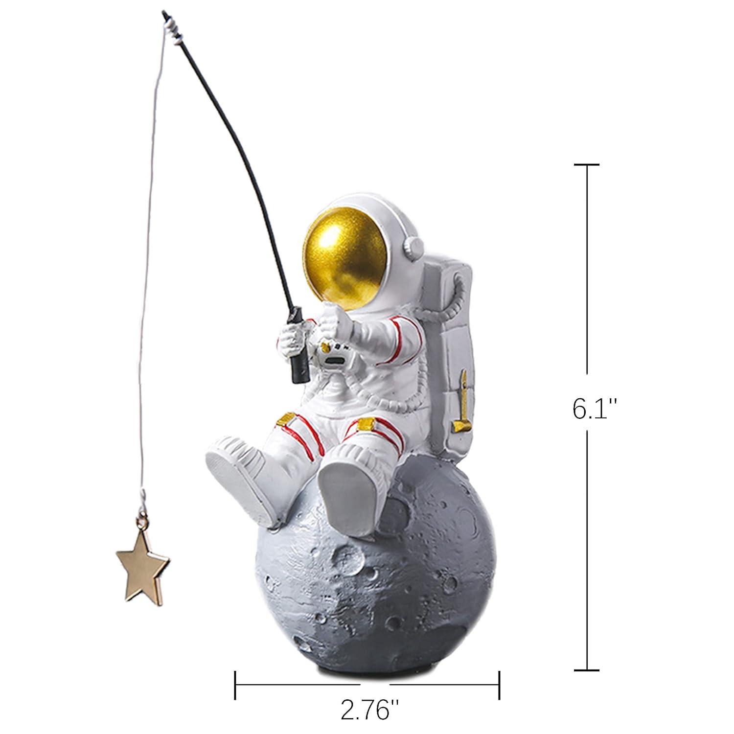 White and Gold Resin Astronaut Fishing Star Figurine