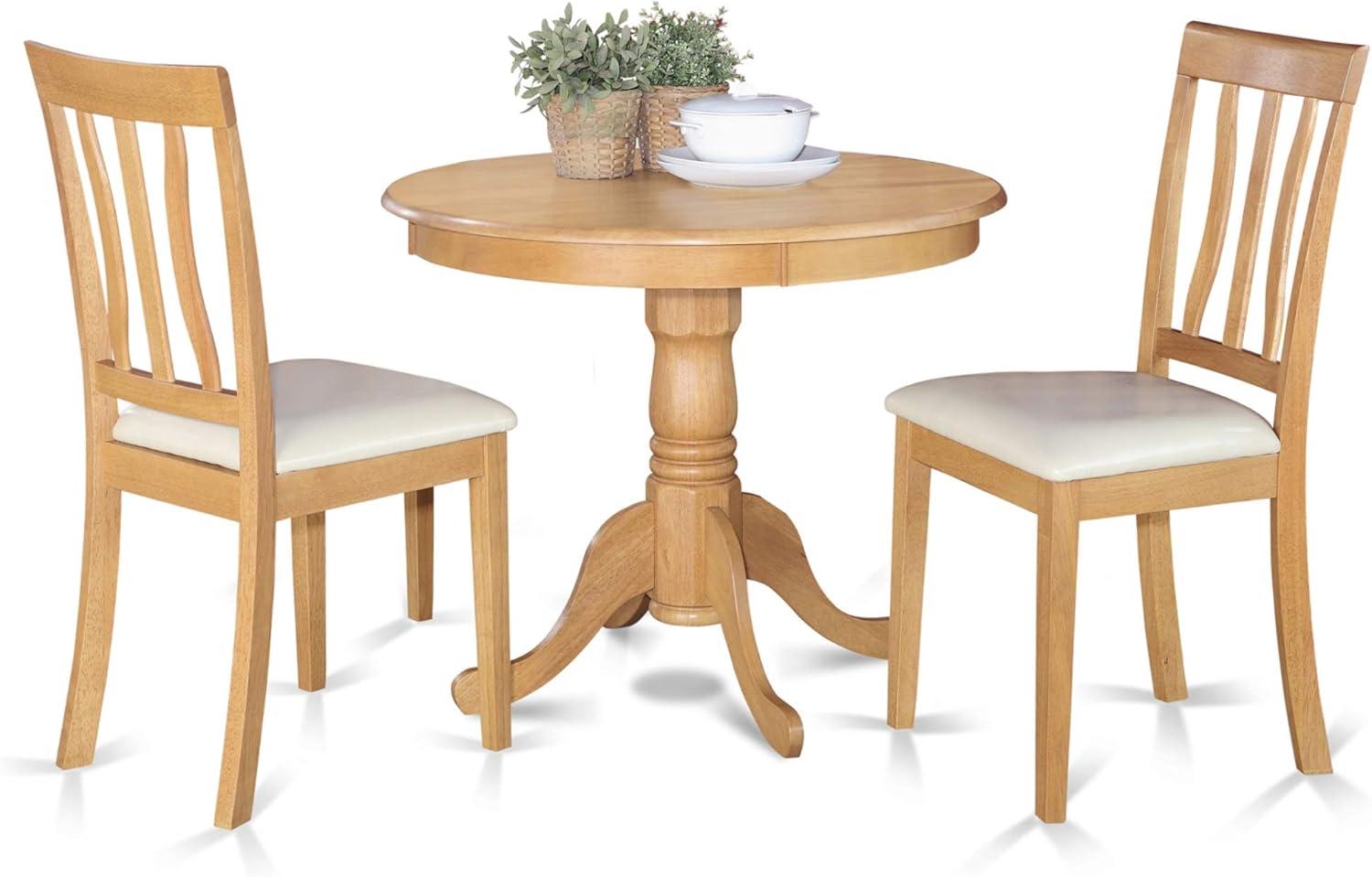 Oak Finish 3-Piece Round Pedestal Dining Set with Faux Leather Chairs