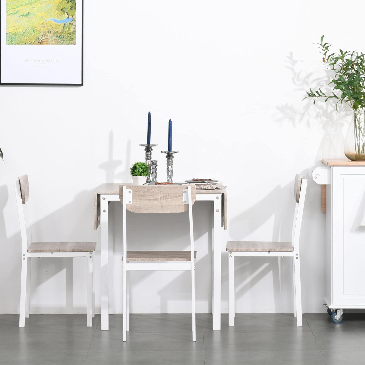 HomCom Modern 5-Piece Dining Table Set for 4 with Foldable Drop Leaf, 4 Chairs, and Metal Frame for Small Spaces, White