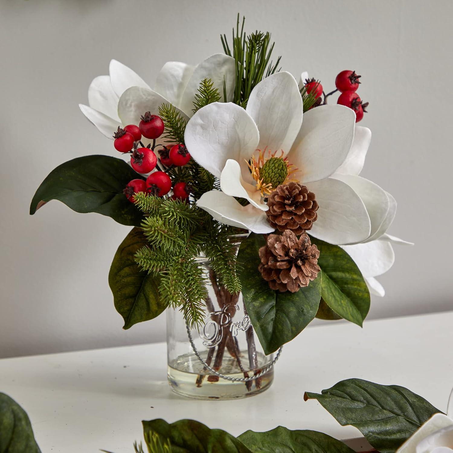 Winter Magnolia, Pine, and Berry Arrangement in Glass Vase