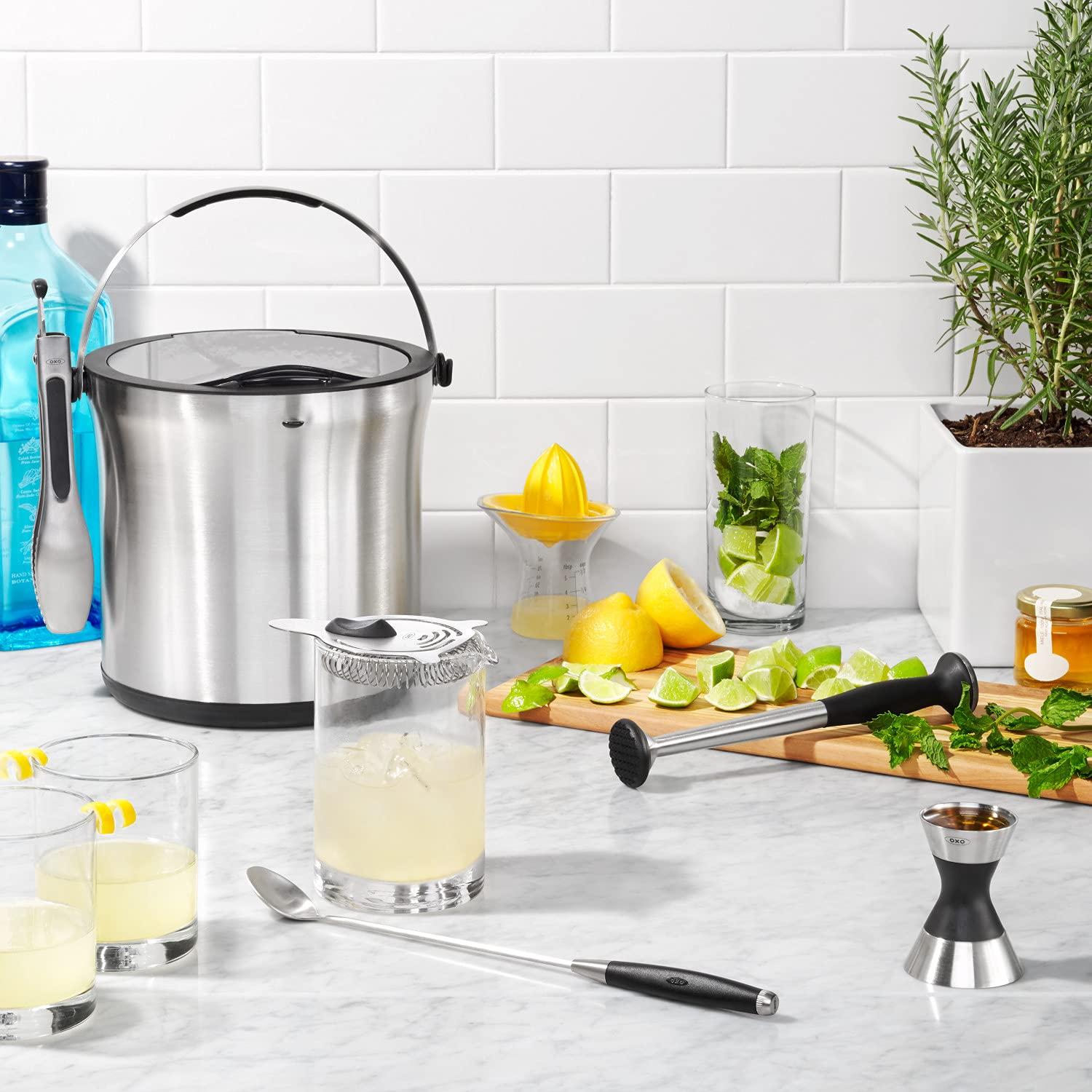 Yellow and Clear Plastic Citrus Juicer with Measurement Markings