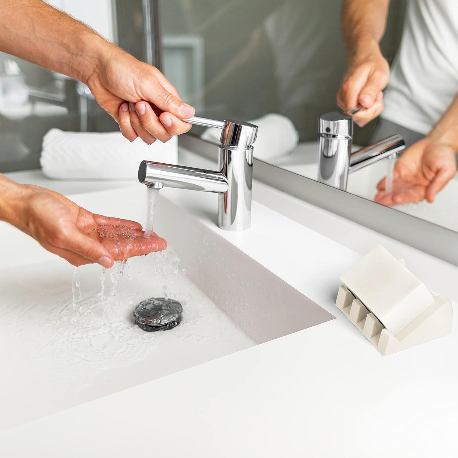 iSoapStone Premium Self-Draining Silicone Soap Dish: Waterfall Bar Holder Tray with Drain Saver, Anti-Slip Kitchen & Bathroom Accessory for Sponges and Bar Soaps - Patent-Pending Design (Light Grey)